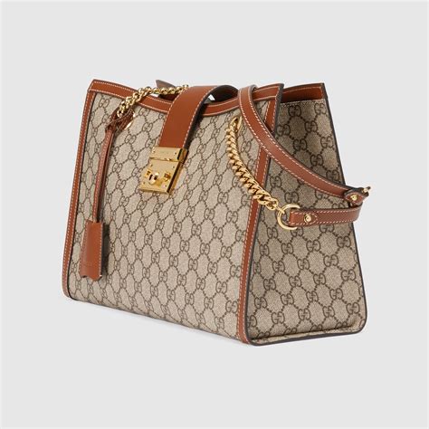 gucci padlock small gg supreme shoulder bag brown|how to open gucci bag.